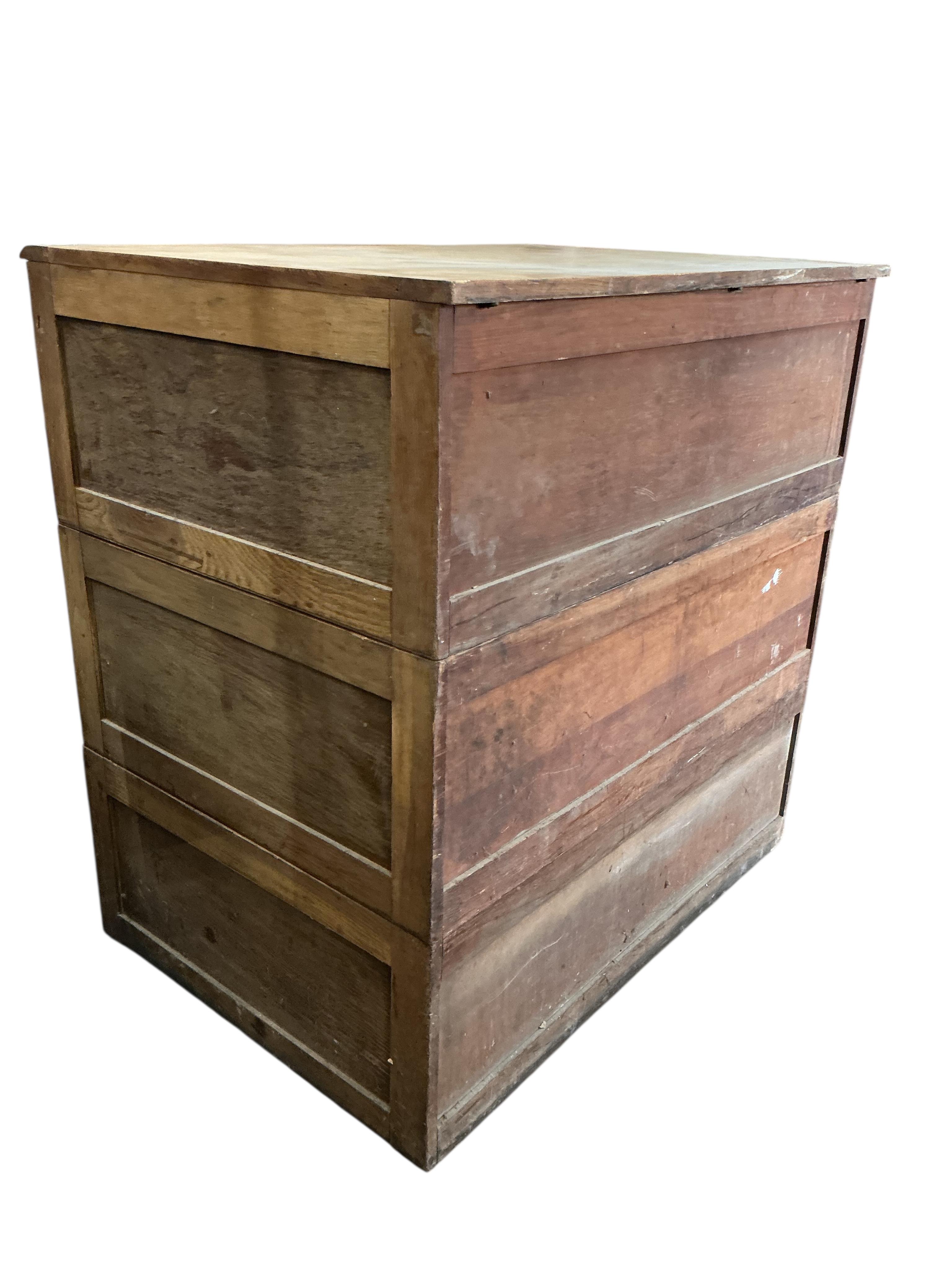 A mid century oak three section plan chest, width 117cm, depth 84cm, height 120cm